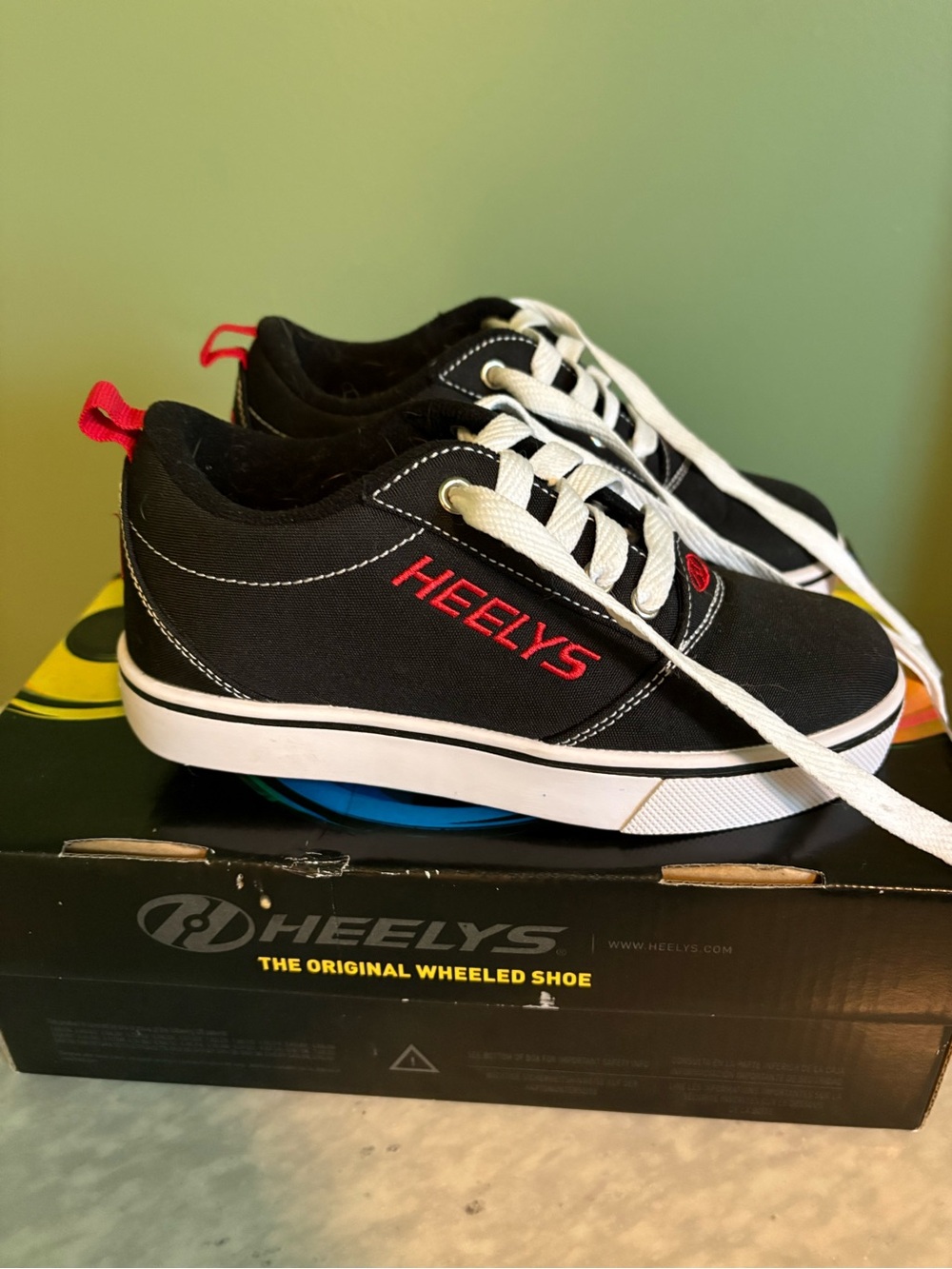 Heelys Black Canvas Sneakers with Red Logo and White Laces